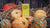 Photo of a yellow box of Absolute Collagen's serum, Maxerum, atop a pile of pumpkins, with hay in the background